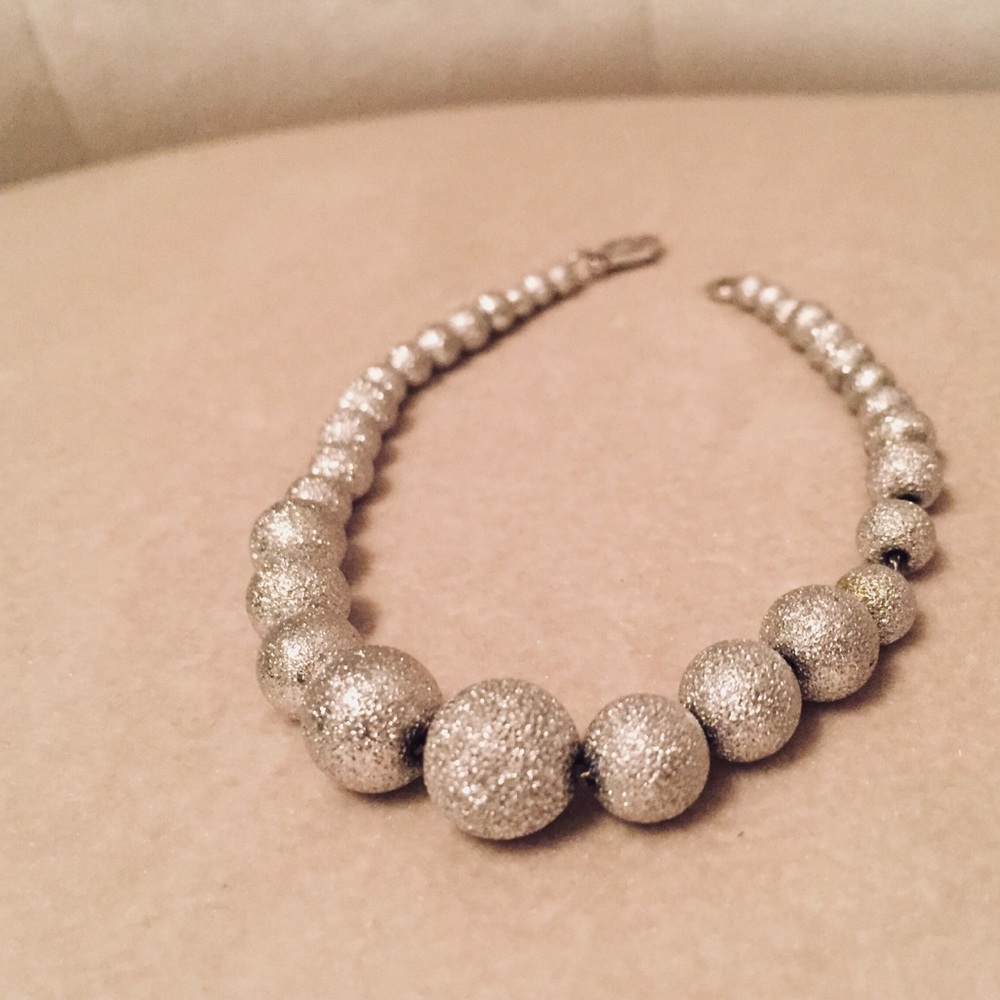 SILVER GRADUATED BEAD BRACELET •.925